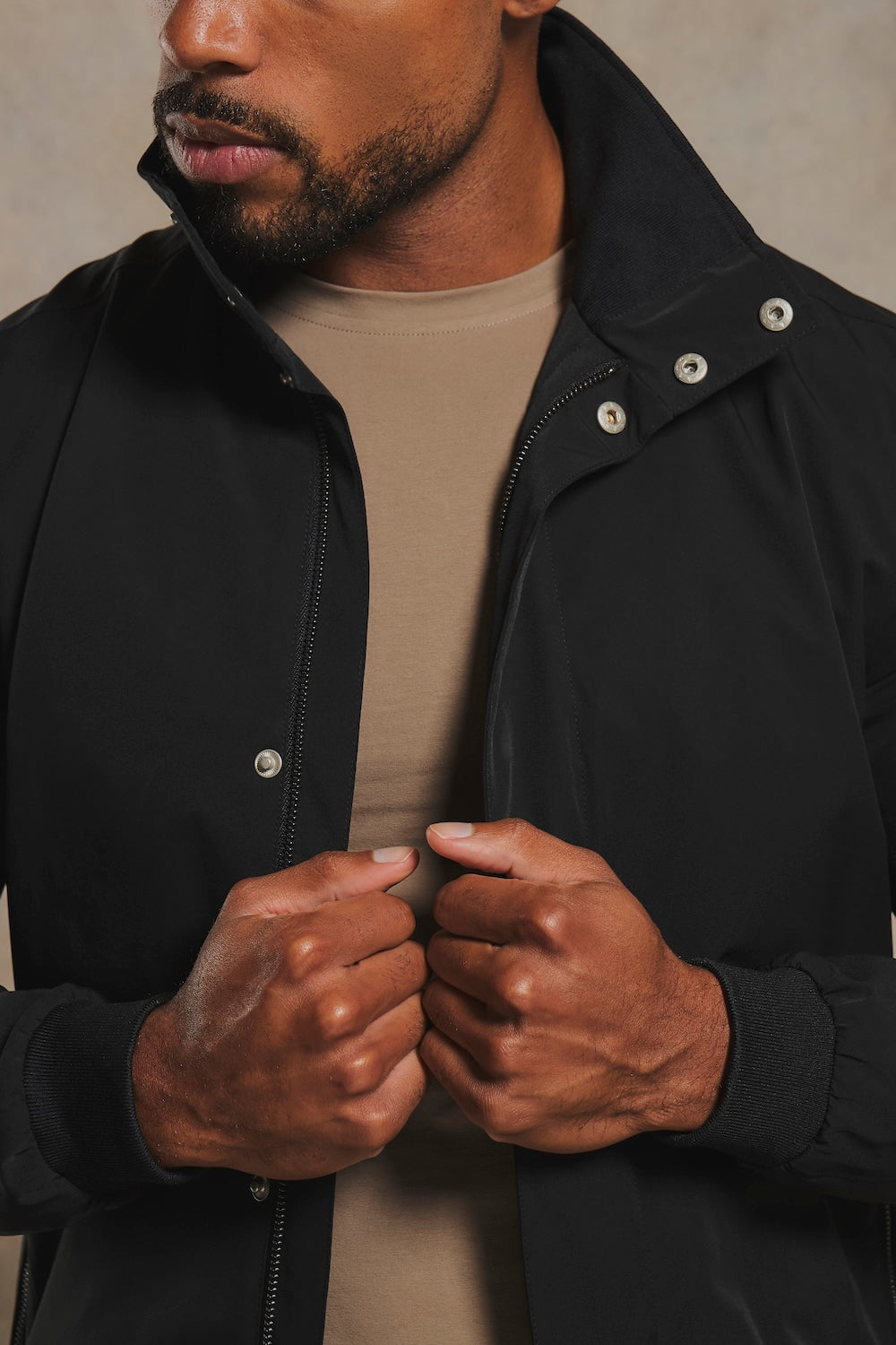 Shower Resistant Funnel Neck Jacket in Black