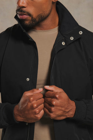 Shower Resistant Funnel Neck Jacket in Black