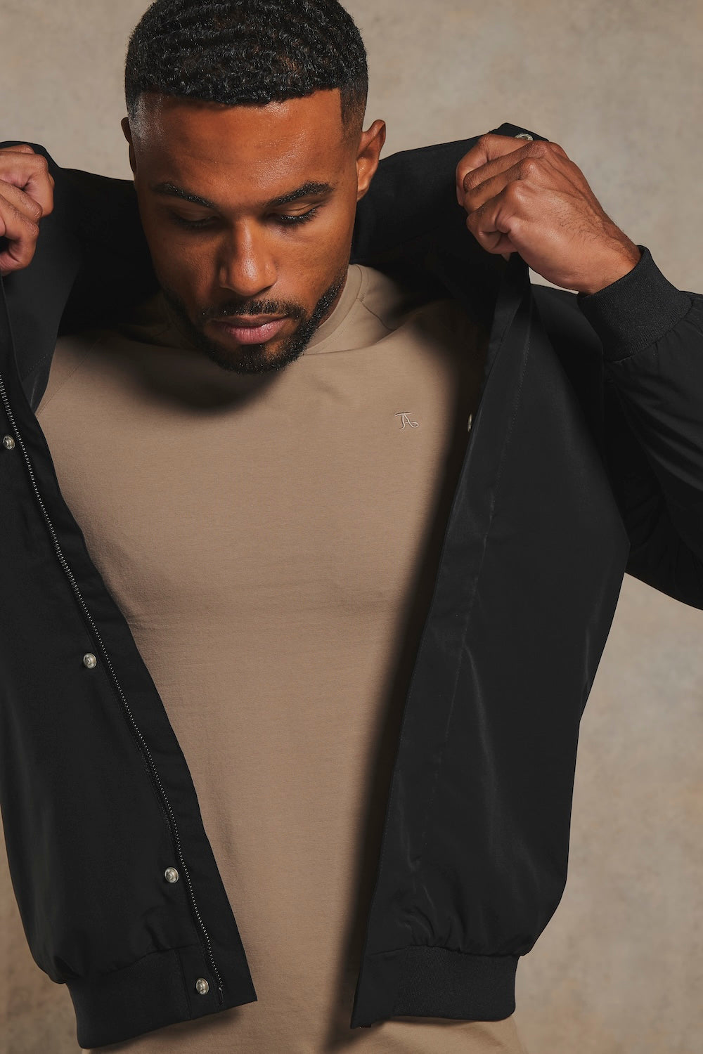 Shower Resistant Funnel Neck Jacket in Black