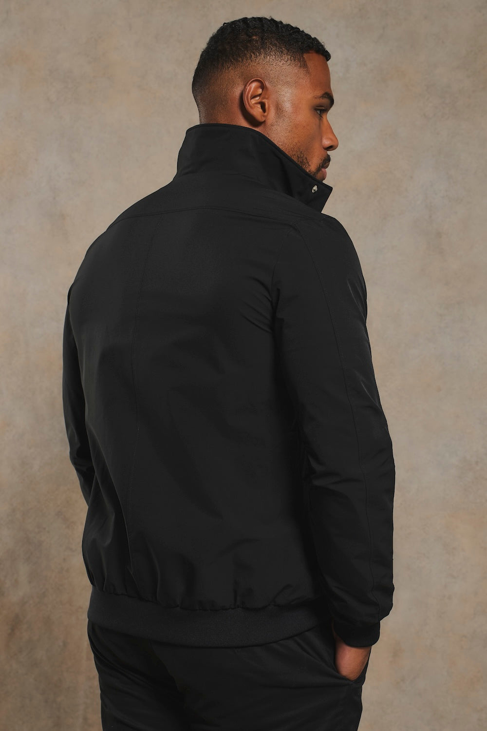 Shower Resistant Funnel Neck Jacket in Black