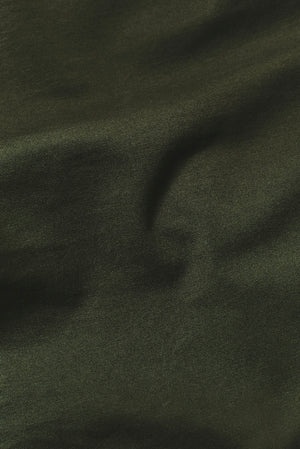 Essential Jersey Buttonless Polo Shirt in Forest Green