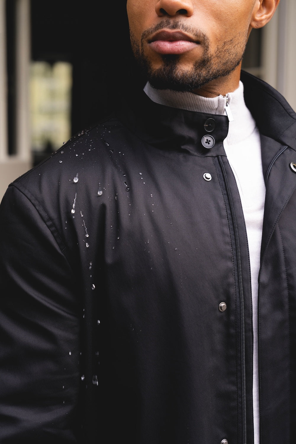 Funnel Neck Shower Resistant Coat in Black