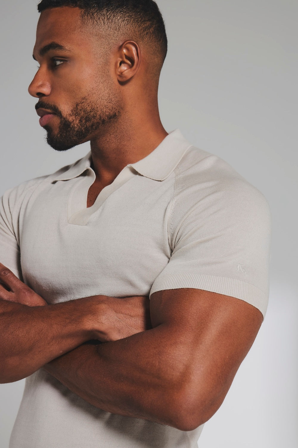 Extra Fine Merino Wool Knitted Open Collar Polo Shirt in Alabaster