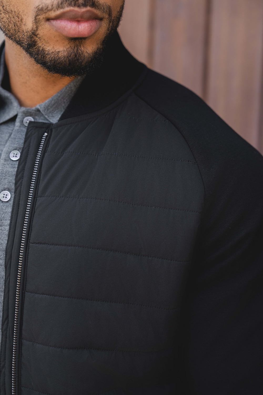 Quilted Hybrid Bomber Jacket in Black