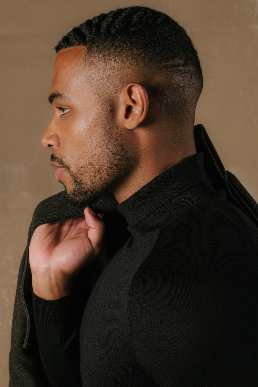 Extra Fine Merino Wool Roll Neck Jumper in Black