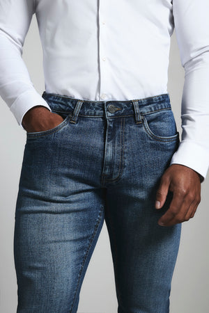 Muscle Fit Stretch Jeans in Mid Blue