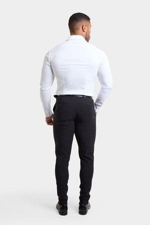 True Muscle Fit Tech Suit Trousers in Black - TAILORED ATHLETE - ROW