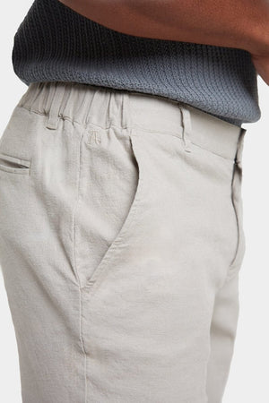 Linen-blend Trousers in Stone - TAILORED ATHLETE - ROW