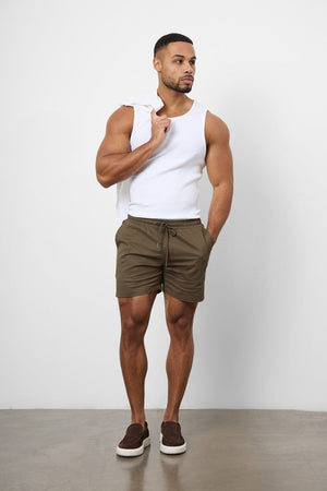 Model is 5'11 and wears a size 34W for a looser fit (31" waist, 31" inside leg)